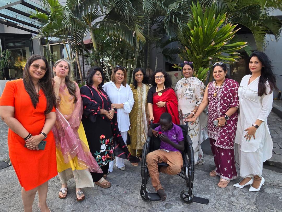 Presentation of Wheel Chair to the Handicapped